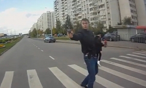Pedestrian Pulls Gun on Biker