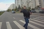 Pedestrian Pulls Gun on Biker