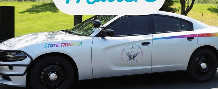 Temporary rainbow decal on OSP cruiser, in support of Pride Month
