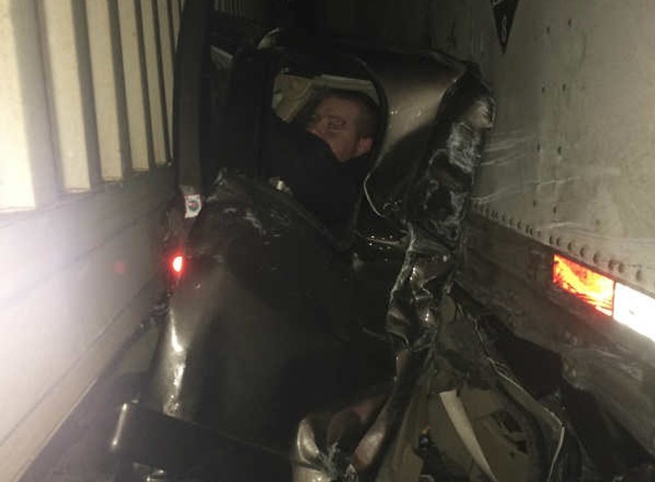 Pickup Driver Survives Being Crushed Between 2 Semis