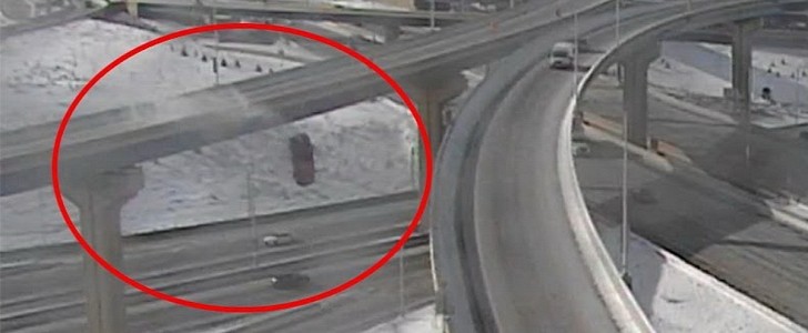 Pickup truck falls from overpass