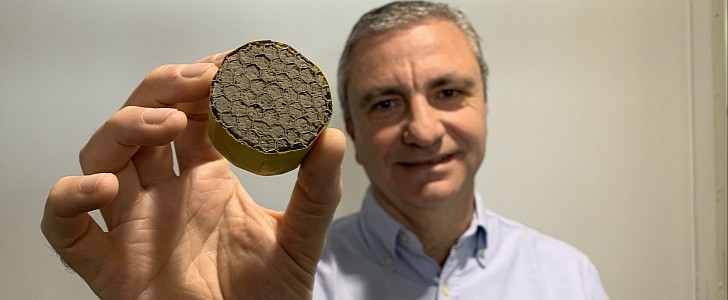 Professor Michele Meo holding graphene oxide/polyvinyl alcohol aerogel in a honeycomb structure