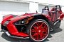 Polaris Slingshot on Fiery-Red Forgiato Wheels Looks Like a Trike from Hell