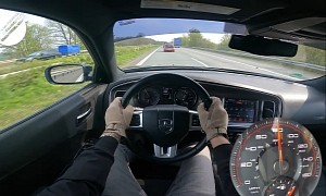 “Police Interceptor” Dodge Charger Takes to the Autobahn, Tiny VW Up! Is Unfazed