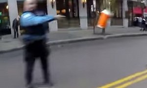 Police Officer Throws Cup Of Coffee At Rider In Chicago
