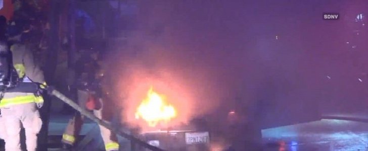 BMW on fire in San Diego, with sleeping man inside