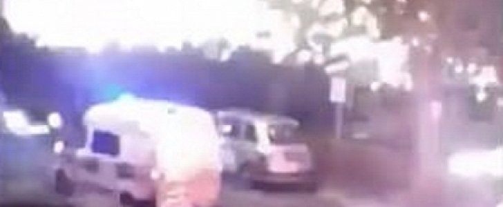 Yobs pelt police van with fireworks in London