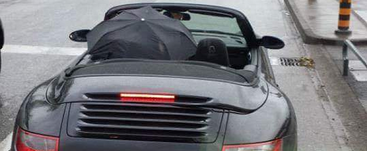 Porsche 911 Cabrio Driving with The Roof Down In the Rain