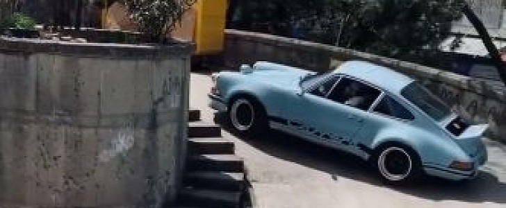 photo of Porsche 911 Carrera RS 3.0 Drifting Out of Underground Garage Is Smooth as Silk image