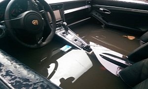 Porsche 911 Caught by the Flood Drowns in Muddy Water