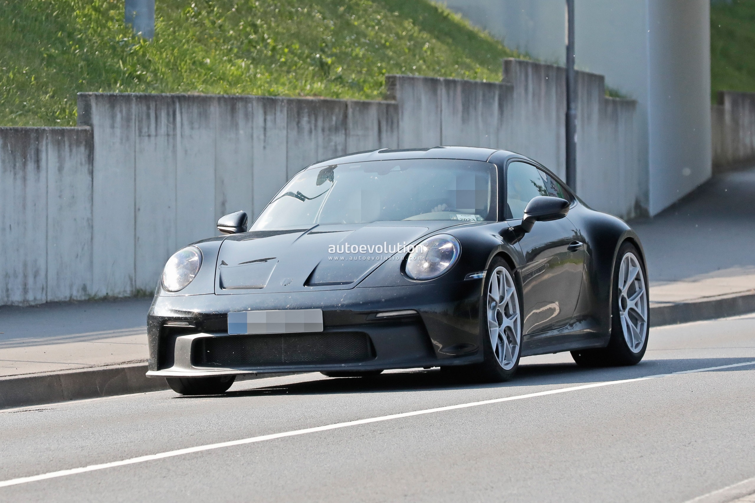 photo of Porsche 911 ST Shows Sexy Skin in New Spy Shots, Looks Like a Sports Car Fitness Model image