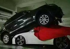 Porsche 911 Trampled by Volkswagen Touareg in China As Woman Mistakes Throttle for Brake