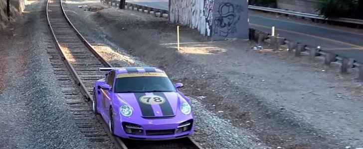 Porsche 911 Turbo Driven on Train Tracks