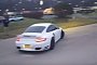 Porsche 911 Turbo Nearly Crashes while Leaving Car Meet, Driver Saves Himself
