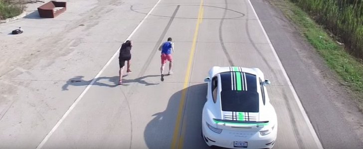 Porsche 911 Turbo S drag races humans