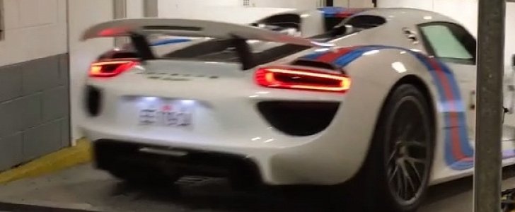 Porsche 918 in Martini Livery Drives Right Under a Parking Barrier in London