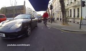 Porsche Boxster Gives the Cold Shoulder to a London Cyclist