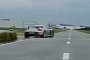 Porsche Carrera GT Drifts Exiting a Parking Lot with Hair-Raising V10 Engine Sound