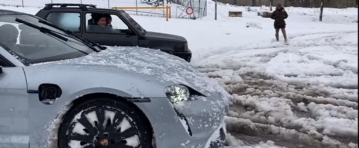 Porsche Taycan vs Fiat Panda 4x4 drag race in the snow (slush)