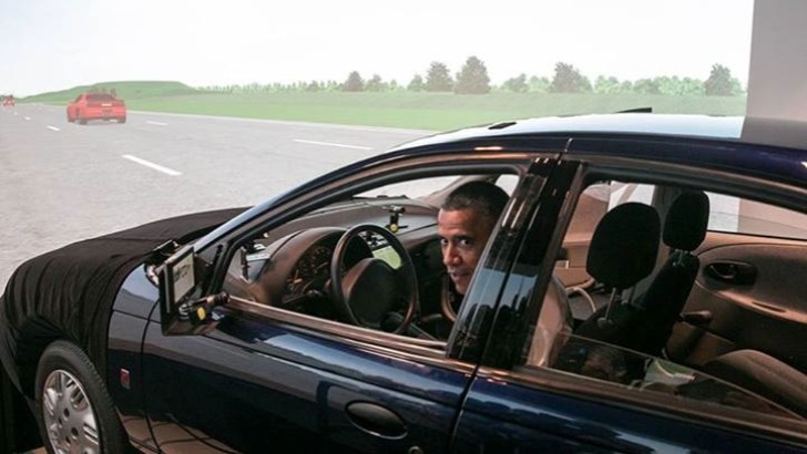 Barack Obama at the wheel of a Saturn SL1 Simulator