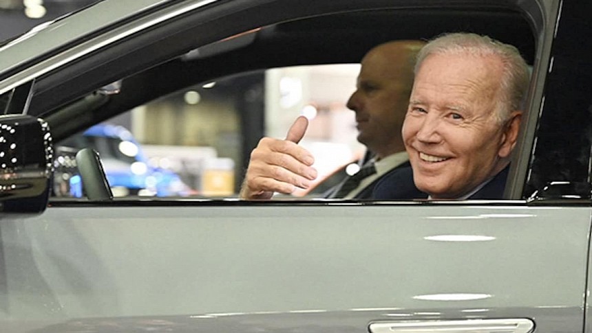 Joe Biden drives a 2023 Cadillac at the 2022 NAIAS