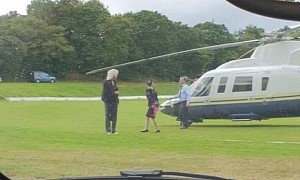 Queen Guitarist Brian May Shows How to Make an Entrance By Landing During a Cricket Game