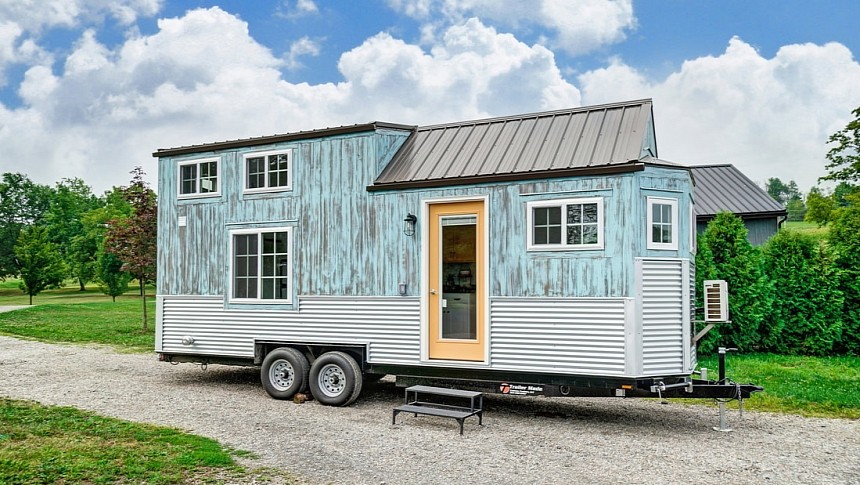 One Particular Harbour is a custom-built tiny house with a fun style and unique storage solutions