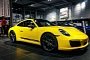 Racing Yellow 2018 Porsche 911 Carrera T Looks Majestic in Porsche Dealership