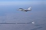RAF Voyager Refuels Qatar's Rafale Fighter Jets Mid-Air for the First Time