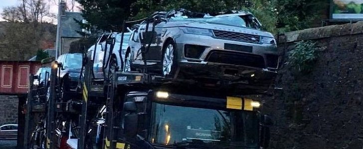 Luxury cars crushed as car transporter passes under bridge in Scotland
