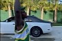 Rapper DaBaby Plays Catch With His Dogs Next to All His Expensive Cars