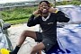 Rapper Jackboy Brags He's "Really Rich," Poses With Two Lambo Urus