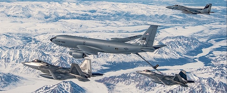 KC-135 Stratotanker feeding Raptors and Eagles