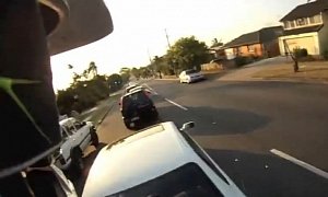 Rear-Ended Rider Flies over the Car in Front