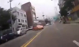 Reckless Driver Doesn't Even Look Out for Incoming Scooter