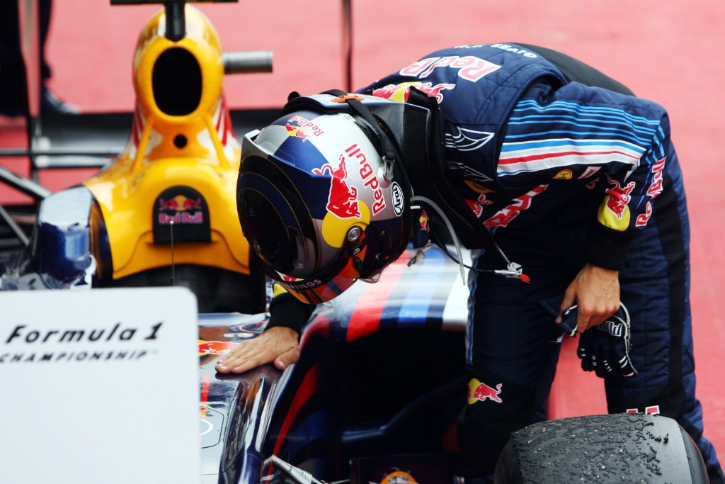 Sebastian Vettel takes care of his RB5 after scoring his second win of the season, at Silverstone