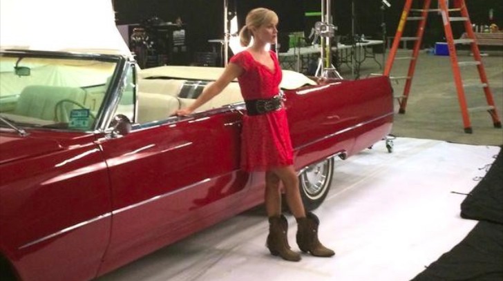 Reese Witherspoon Sits Next to a Cadillac Eldorado