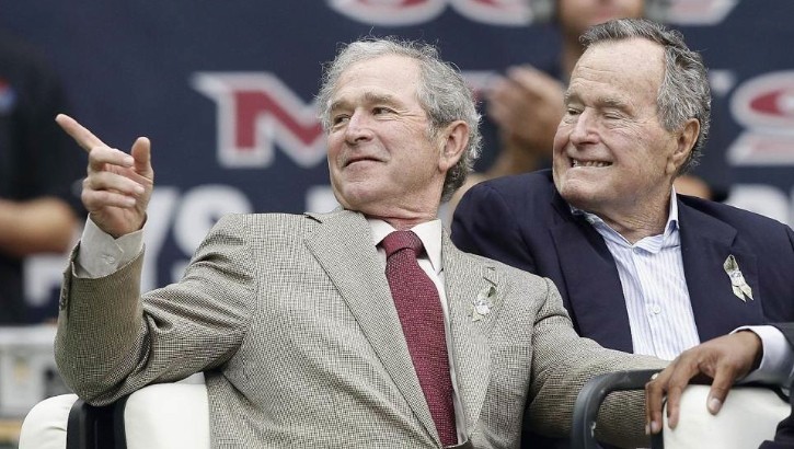 George W. Bush and tennis legend John Newcombe in 2013
