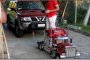Remote Control Toy Truck Tows a Nissan SUV