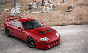 Renaissance Red Toyota Supra Posing In a Weird Location