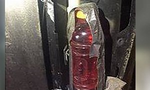 Resourceful Truck Driver Replaces Busted Taillight With Red Sports Drink