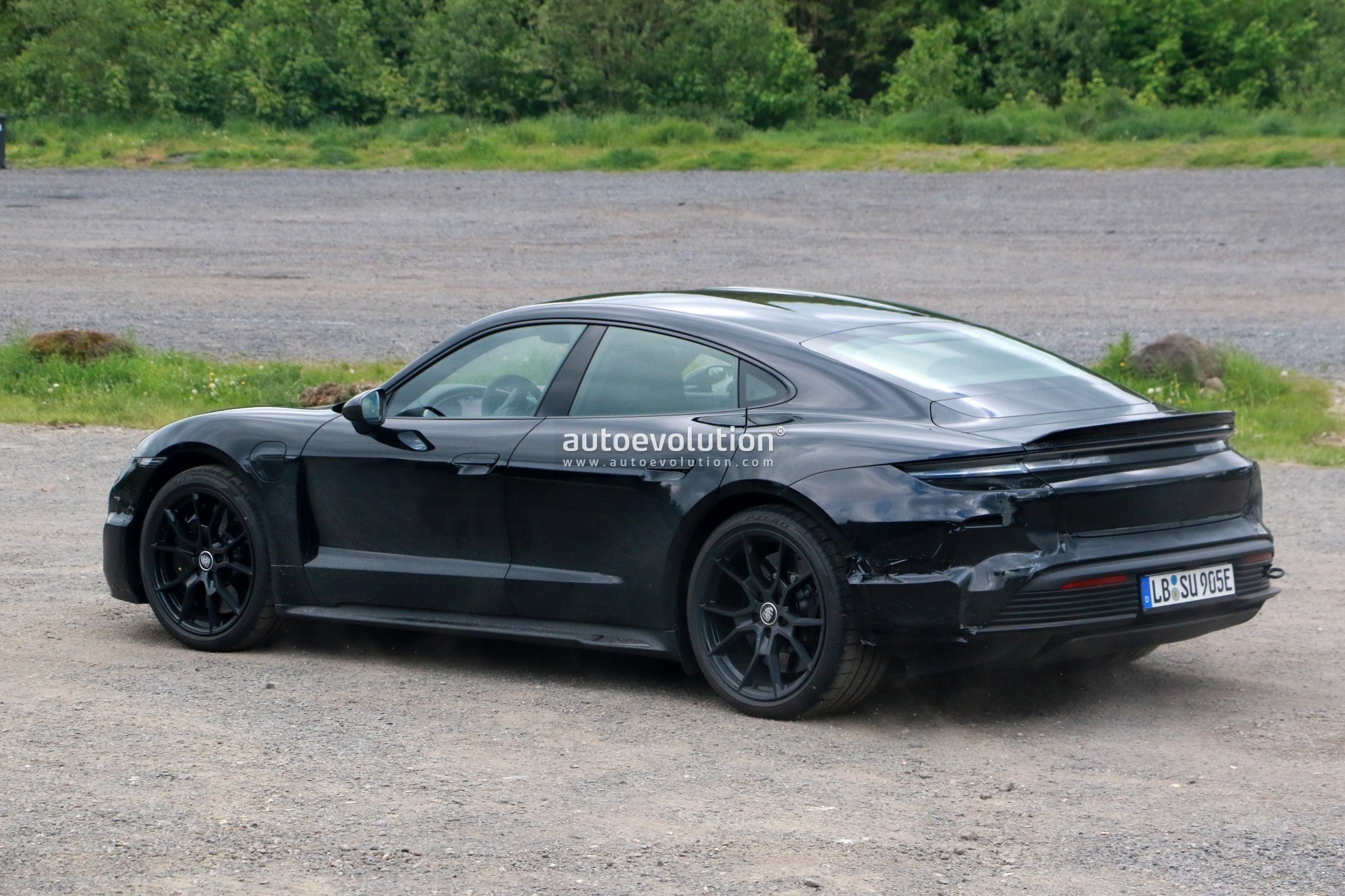 photo of Revised Porsche Taycan Shows Off New Cockpit, Ducktail Spoiler image