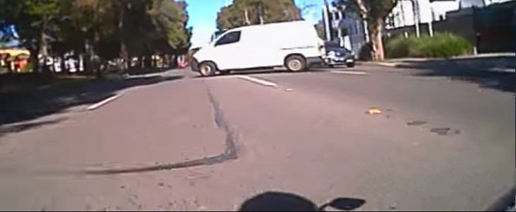 Rider crashes into van