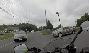 Rider Gets Cut Off By Car Turning Left - Swerves Like a Pro