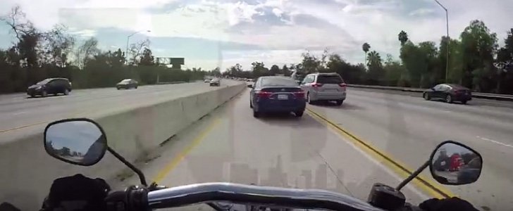 Car cuts rider in hov lane