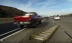 Rider Goes Down On Highway Because Of a Ladder