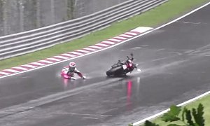 Rider High-Sides in Heavy Rain at the Nordschleife