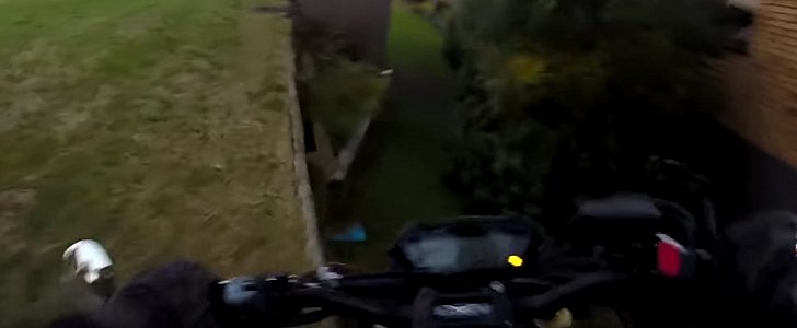 Rider crashes into backyard