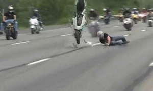 Rider Nearly Run Over by Fellows After Wheelie Crash