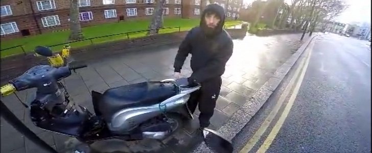 Thief attempting to steal scooter